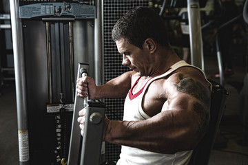 Portrait of a muscular man in the gym