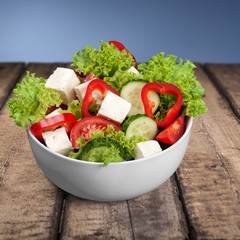 Diabetic. Diet meal. Vegetables salad in a bowl with weight