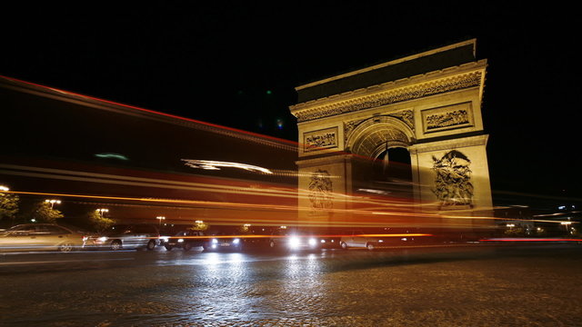 timelapse of the arc de triumph, paris, france at night