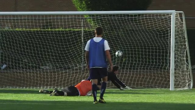 SLO MO MS PAN Player scoring goal on field / Provo, Utah, USA