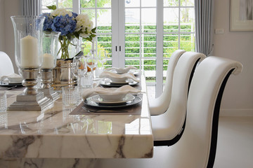 dining table and comfortable chairs in vintage style with elegan