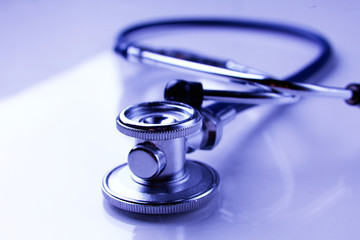 Medical stethoscope in white background