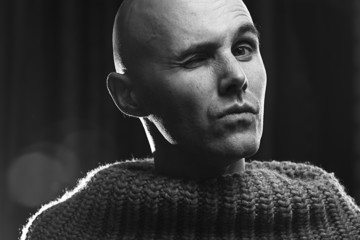 portrait of a man in a sweater