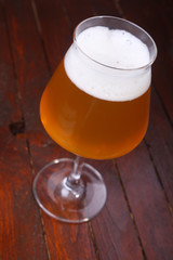 Wheat beer on wood