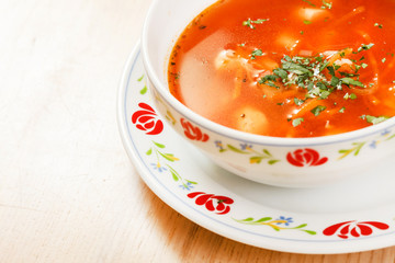 tomato soup with vegetables and meat