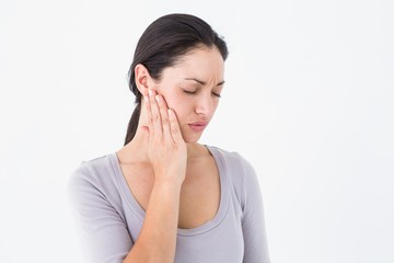 Woman suffering from teeth pain