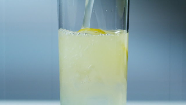 pouring a glass of lemonade