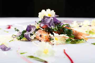 Restaurant style dish with fish and vegetables