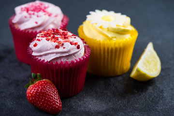 Strawberry and lemon cupcakes with fresh fruit