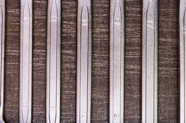 wrenches on a metal background