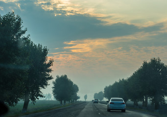 Early in the morning journey by car