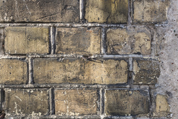Old yellow vintage brick wall