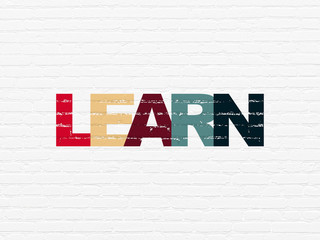 Education concept: Learn on wall background