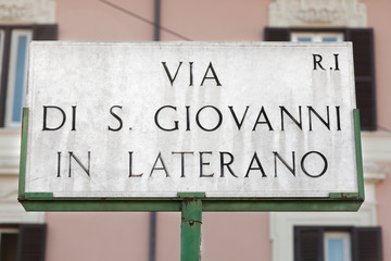 Fototapeta premium Via di San Giovanni in Laterano road sign in Rome, Italy