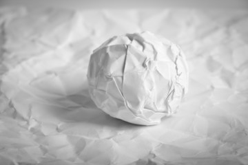 Paper Ball on wrinkled paper