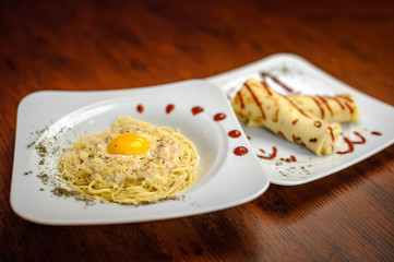 A delicious breakfast is served on a white plate