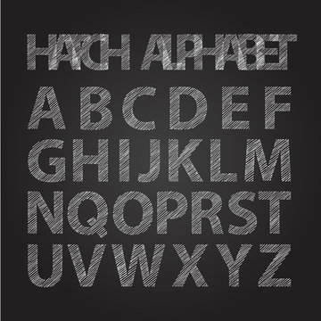 upper-case stripped alphabet on chalkboard