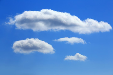 white clouds in the blue sky