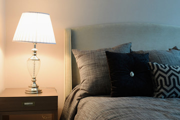 stylish bedroom interior design with black patterned pillows on