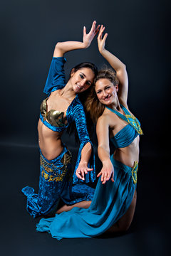 Pair of female belly dancers