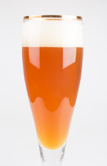 glass with beer on white background