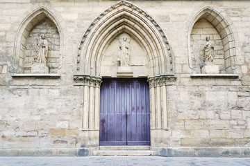 Portal in romanesque church in Reims, France.