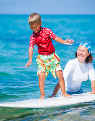 Fototapeta na wymiar Boy with surf