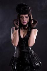 Sensual gothic girl in hat with veil