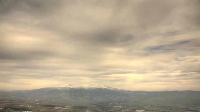 Clouds over Mount Hermon top view time lapse