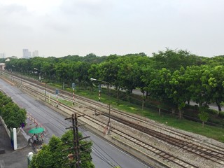 Fototapeta na wymiar Railway towards urban city