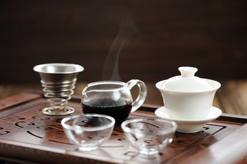 China tea ceremony with puerh tea brewing in haiwan