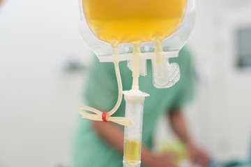 giving fresh frozen plasma blood components during surgery