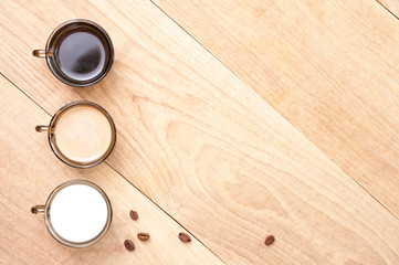 cup with coffee, milk and cocoa