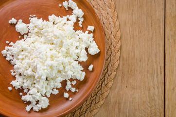 curds on the brown plate