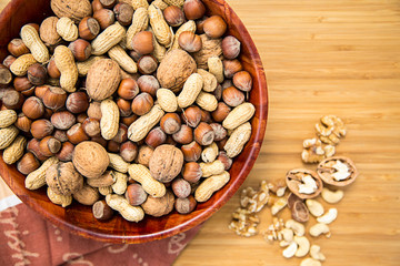 Nut mix in wooden bowl