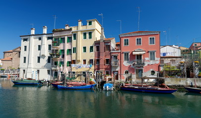 Fototapeta premium Canal at the old town of Chioggia - Italy.