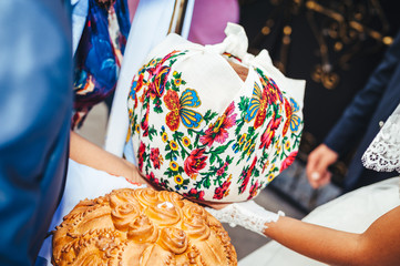 Young newlyweds kiss and enjoying romantic moment together at