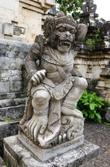 Fototapeta na wymiar Guardians Sculpture at Uluwatu Temple - An ancient Hindu temple in Uluwatu Bali Indonesia.