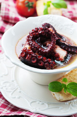 Cooked octopus with bread