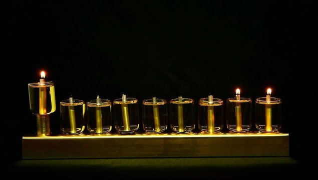 2 flames in Hanukia made of olive oil lanterns