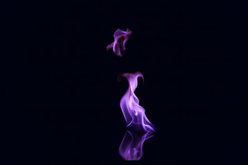 Purple flames isolated