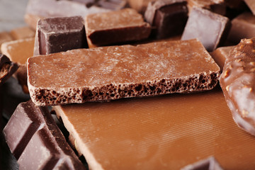Set of chocolate on wooden table, closeup