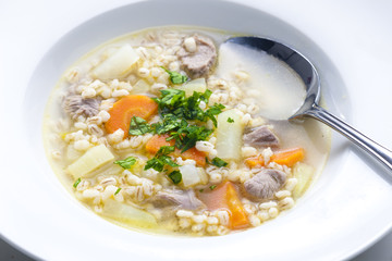 Scottish soup of mutton meat with kohlrabi and barley