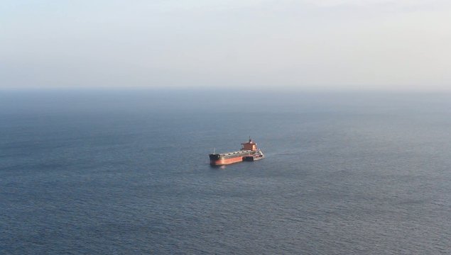 Oil Tanker ship on ocean horizon
