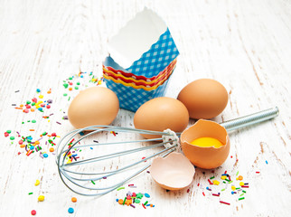 eggs, whisk and cupcake liners