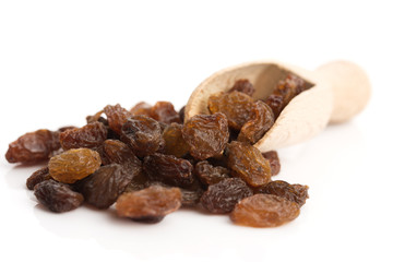 Dried raisins on a white background