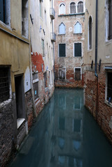 Fototapeta na wymiar Fragment of Venetian Canal