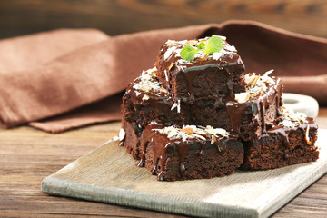 Delicious chocolate cakes on table close-up