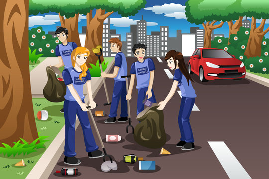 Kids volunteering by cleaning up the road