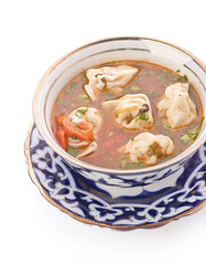 Bowl of chicken soup with vegetables and noodles